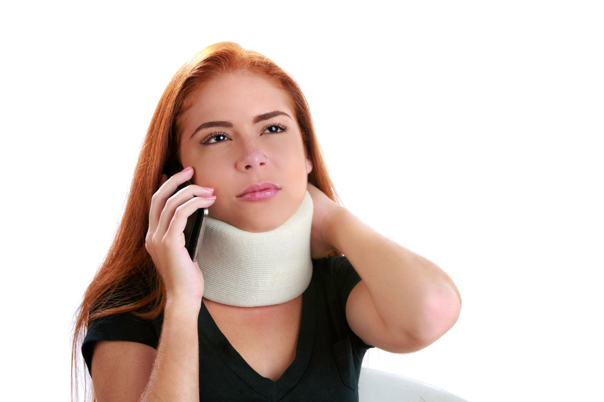 Young woman calling insurance company due to neck injury